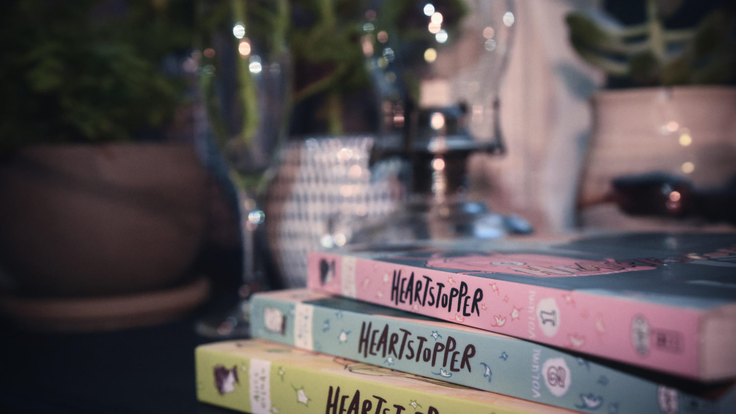 A stack of three books