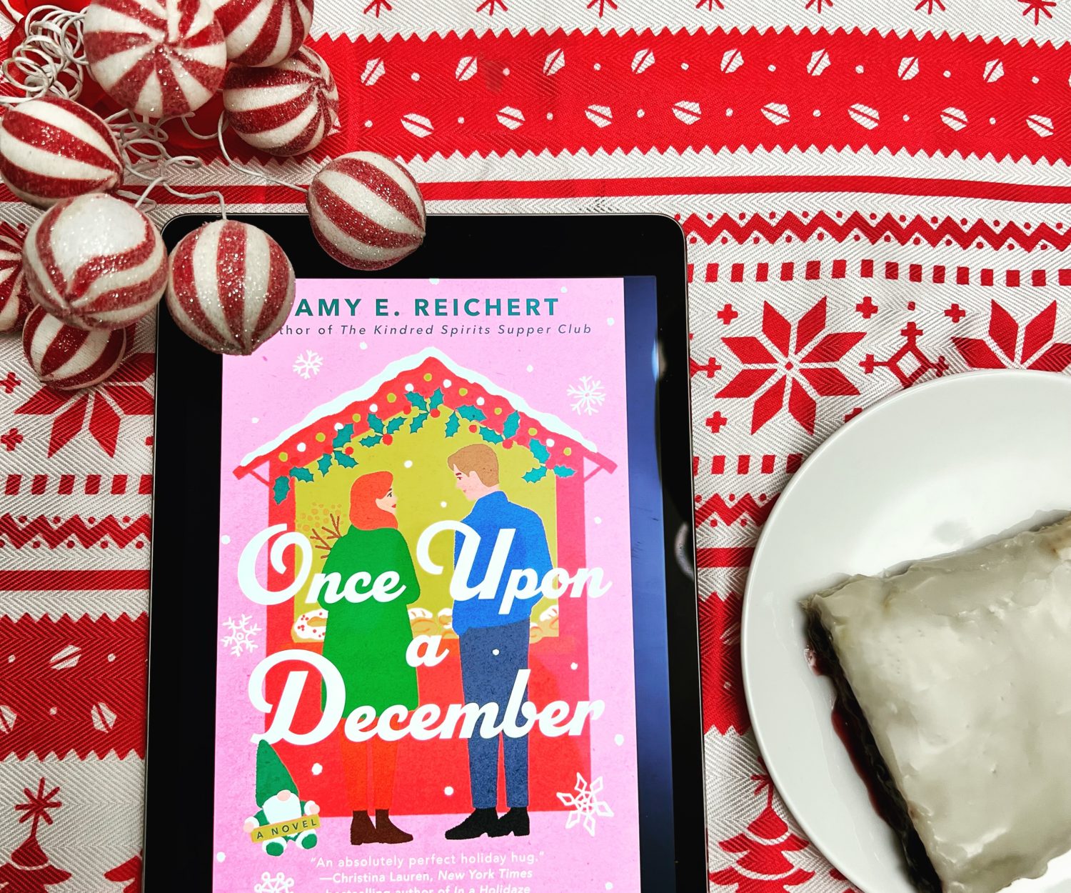 Book cover of Once Upon a December with a cherry kringle on a plate