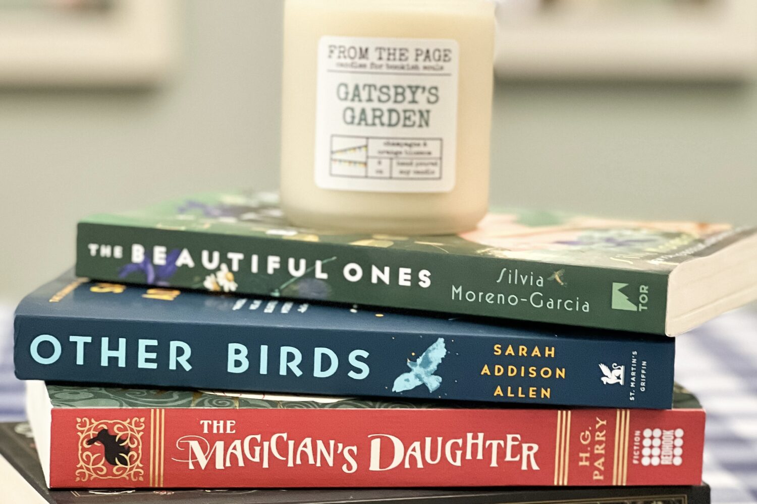 A stack of cozy fantasy books